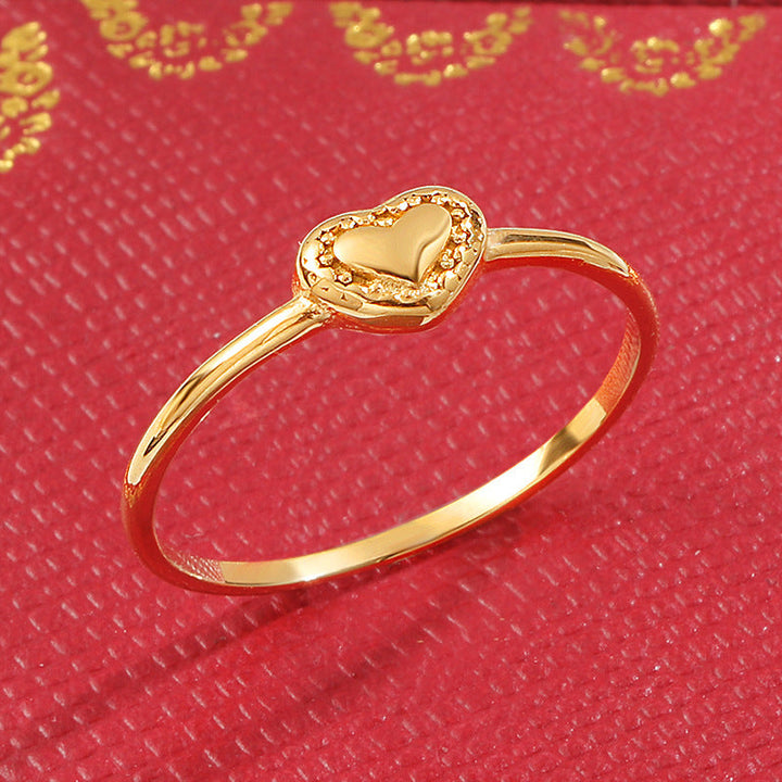 Ladies' delicate ring with heart-shaped design and sparkling accents Nin Boutique