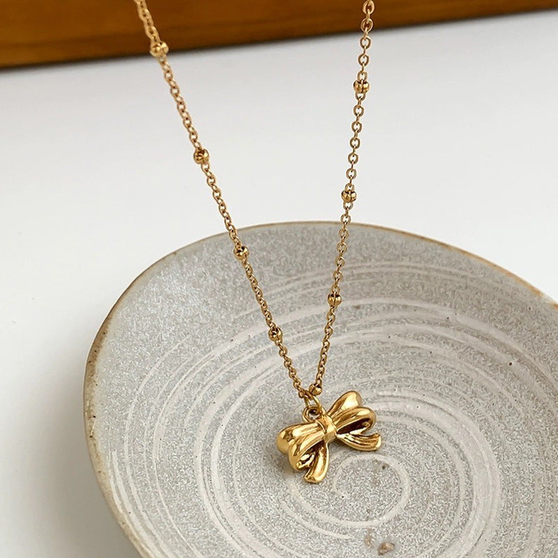 Ladies necklace with elegant bow pendant made of high-quality stainless steel Nin Boutique