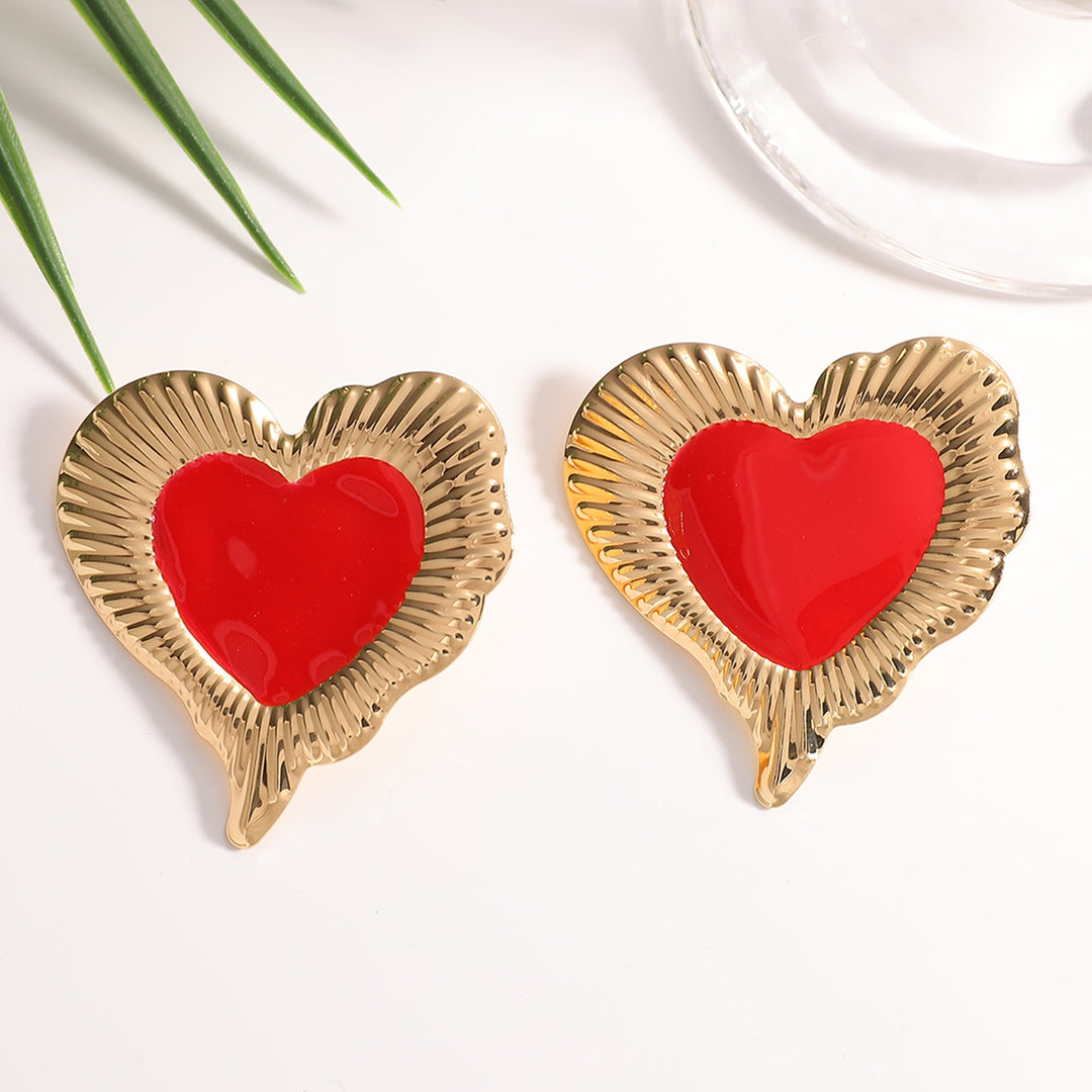 Ladies earrings in heart-shaped, glamorous design Nin Boutique