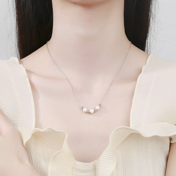 Women's necklace with radiant pearls and stylish silver accents Nin Boutique