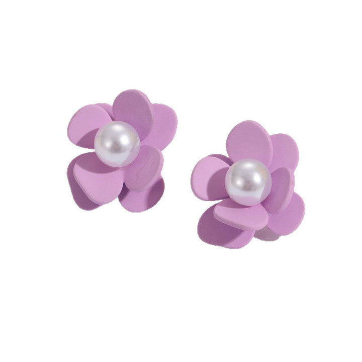 Ladies earrings in vibrant floral design with pearl accent Nin Boutique