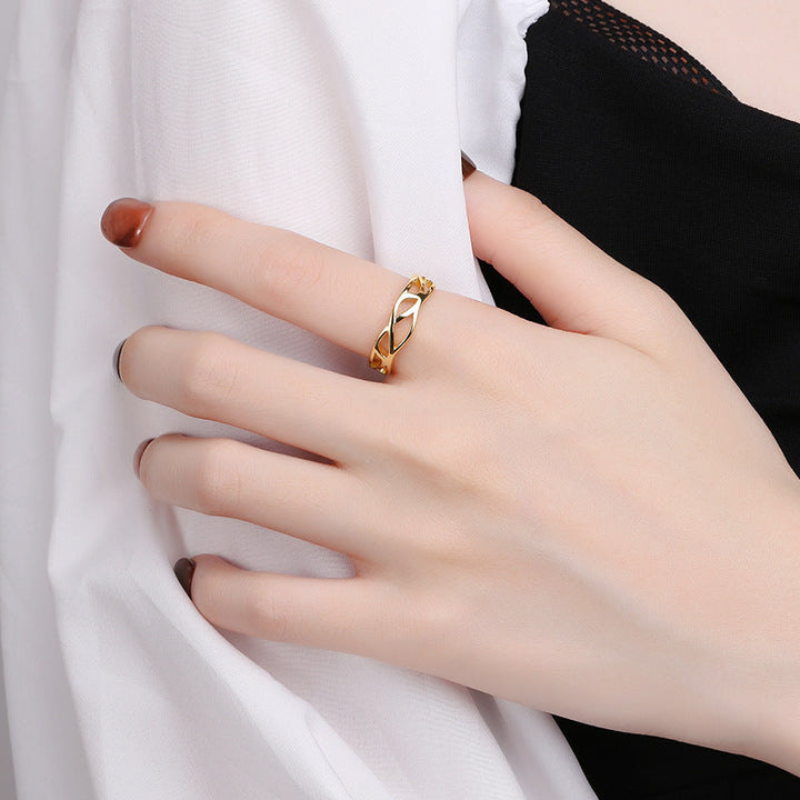 Women’s ring with curved design and elegant cutouts Nin Boutique