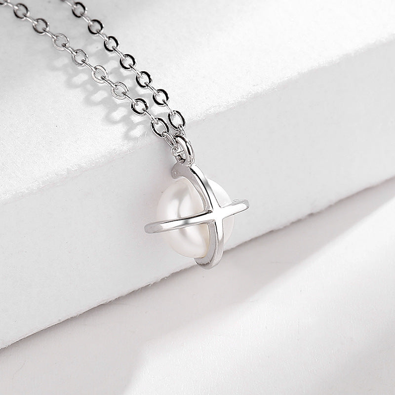 Women's necklace with elegant pearl design and fine gold pendant Nin Boutique