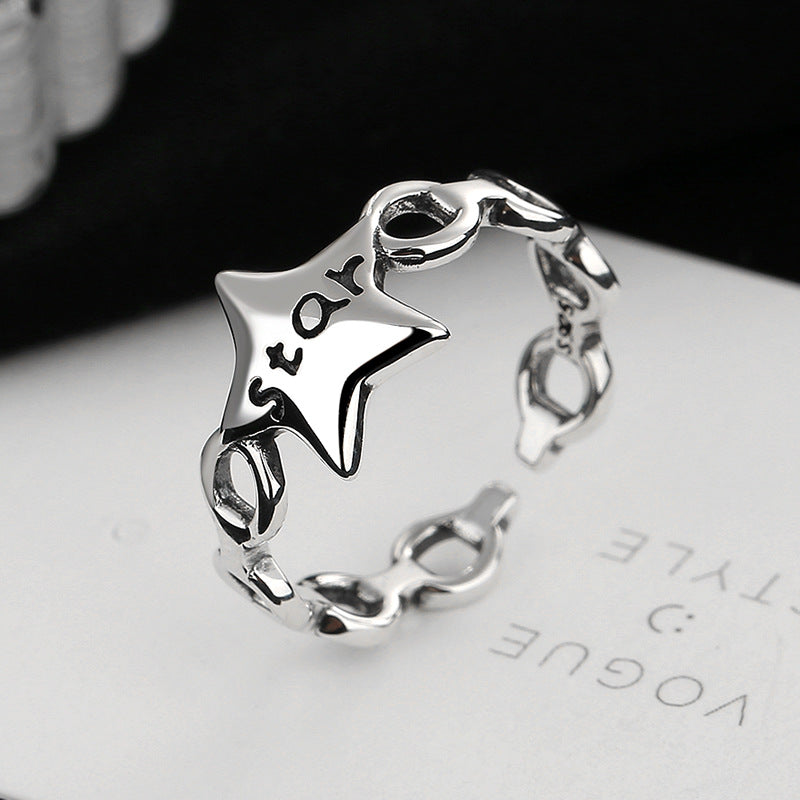 Women's ring with modern star design and engraved lettering Nin Boutique