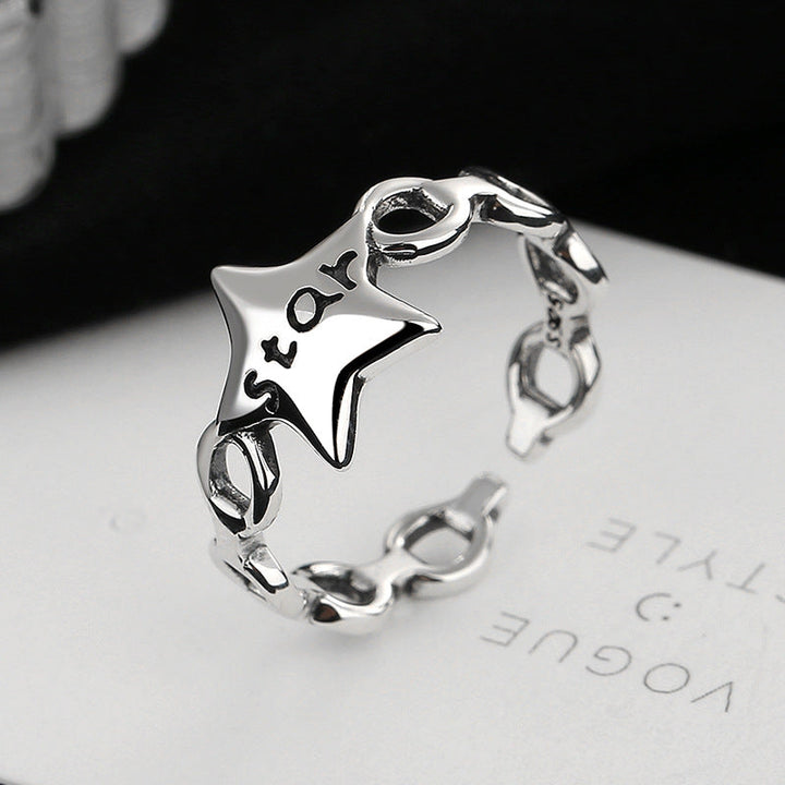Women's ring with modern star design and engraved lettering Nin Boutique