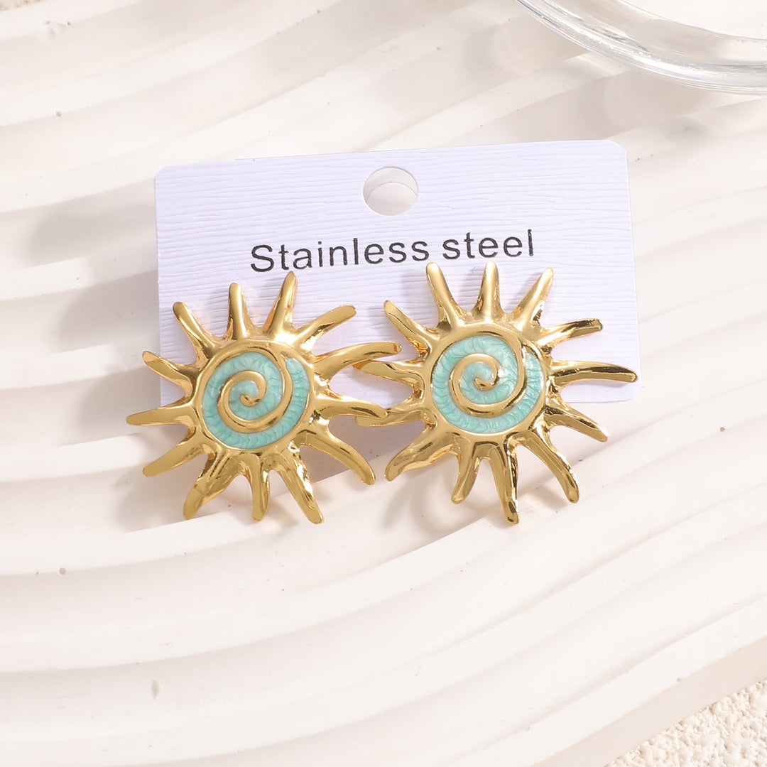 Ladies earrings in artistic sun motif Nin Boutique