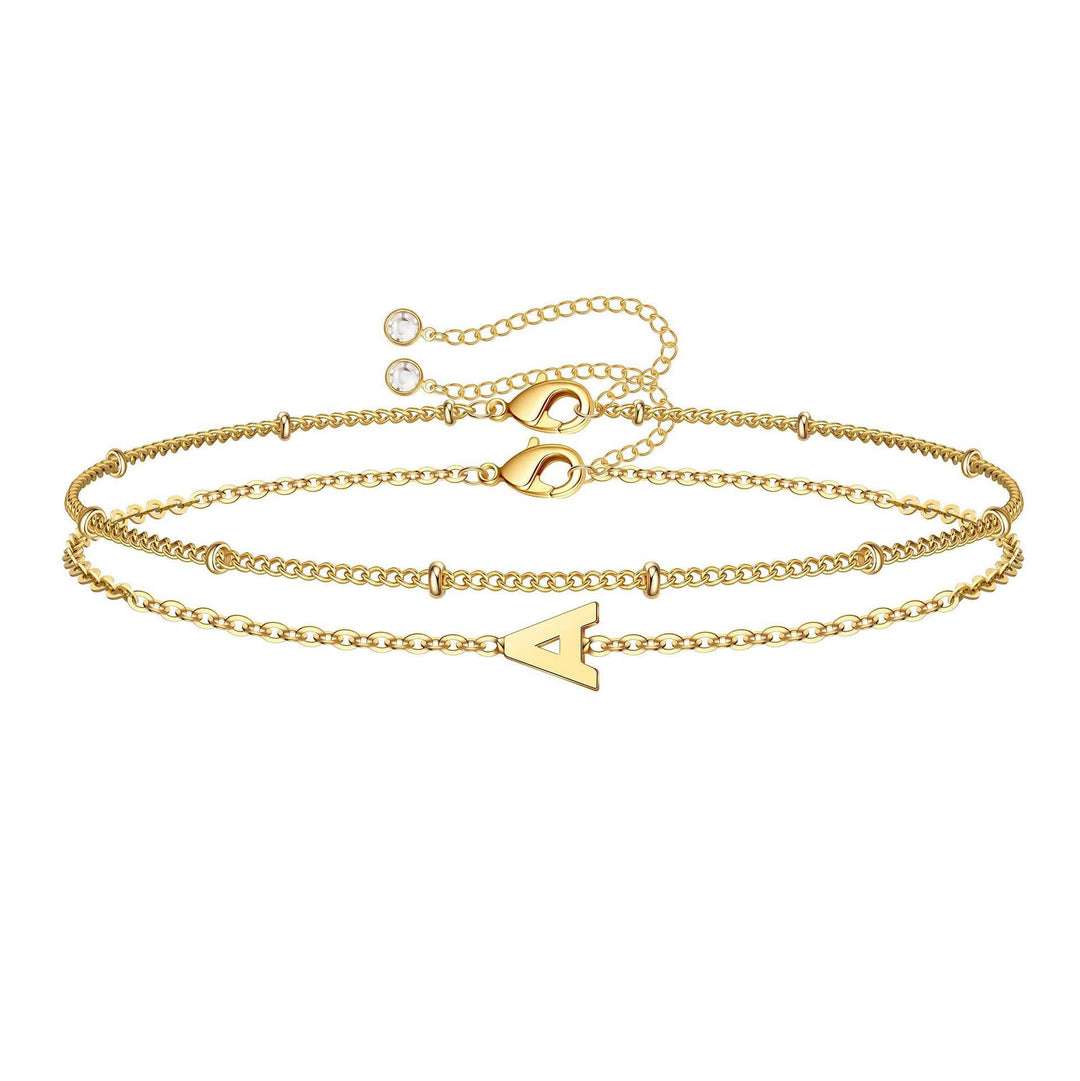 Ladies ankle bracelet with charming letter pendant and delicate chain design Nin Boutique