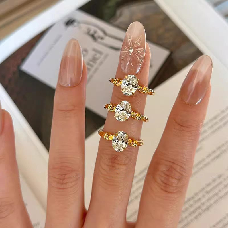 Ladies ring with elaborate oval crystal and elegant wire design Nin Boutique