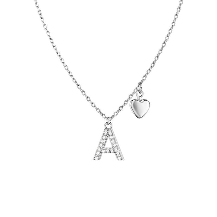 Women's necklace with individually designed initial and heart pendant Nin Boutique