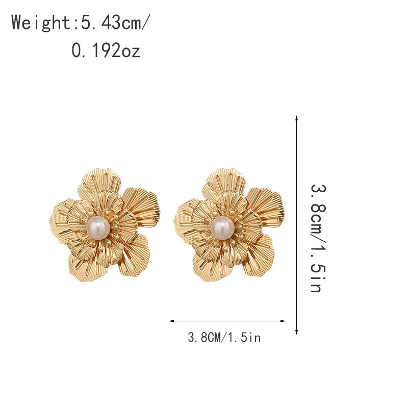 Women's earrings with artistic flower design and pearl accents Nin Boutique