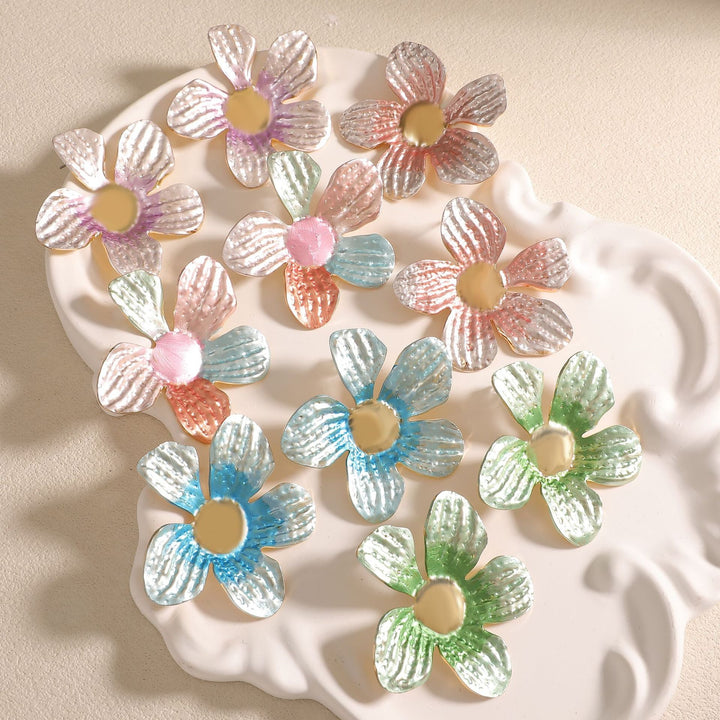Ladies earrings in artistic flower design Nin Boutique