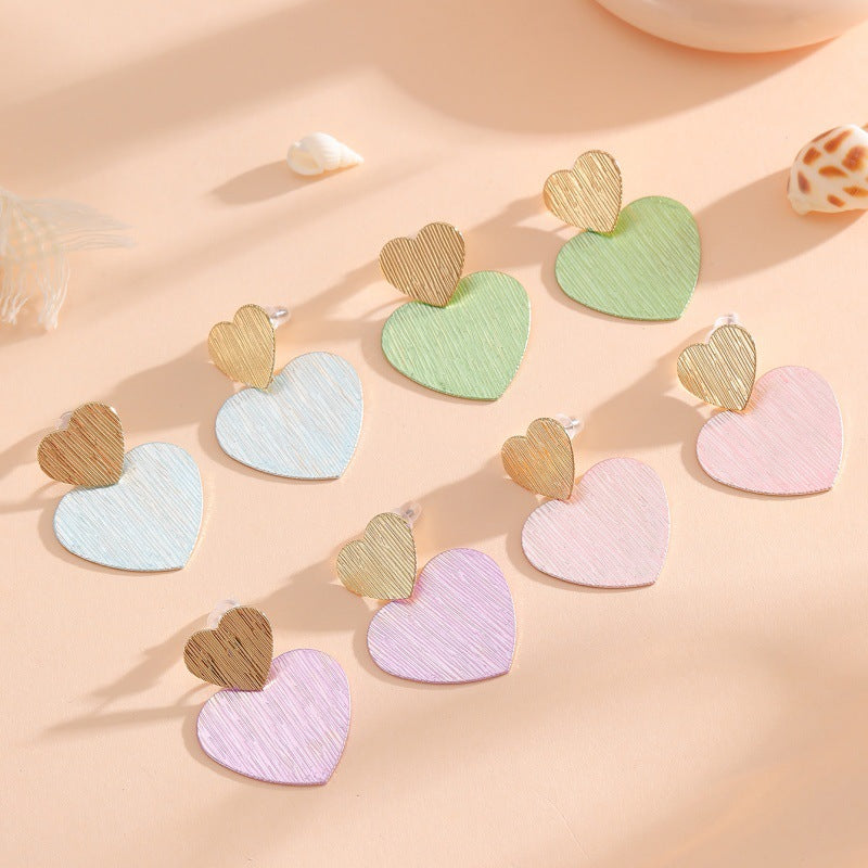 Ladies earrings in modern heart design Nin Boutique