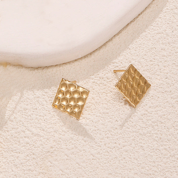 Ladies earrings in artistic face design Nin Boutique