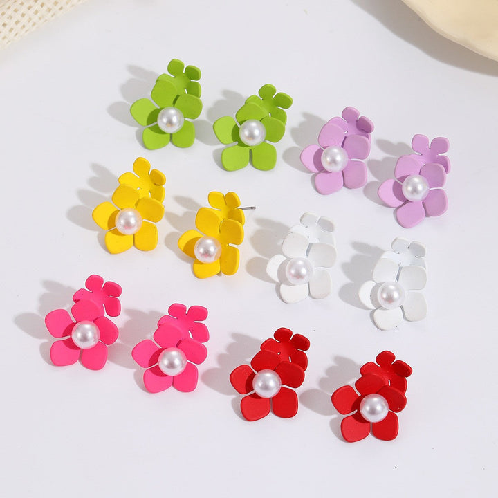 Women’s earrings with artistic floral motif and pearl accent Nin Boutique