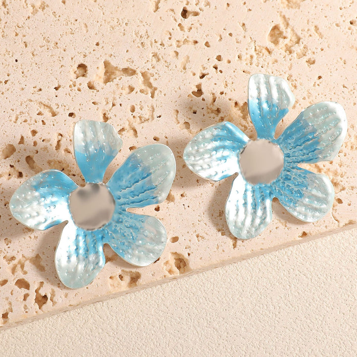 Ladies earrings in artistic flower design Nin Boutique