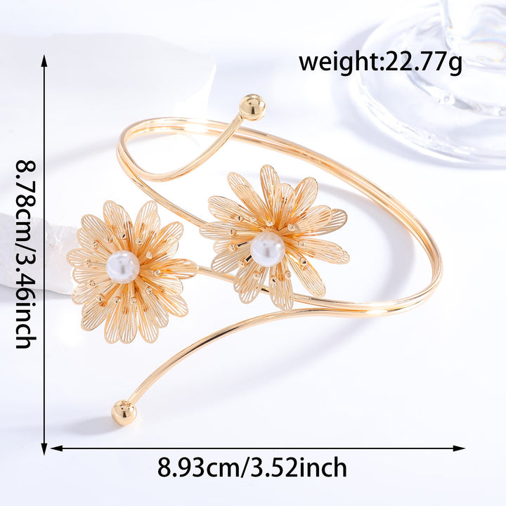Ladies elegant arm jewelry with floral motifs Nin Boutique