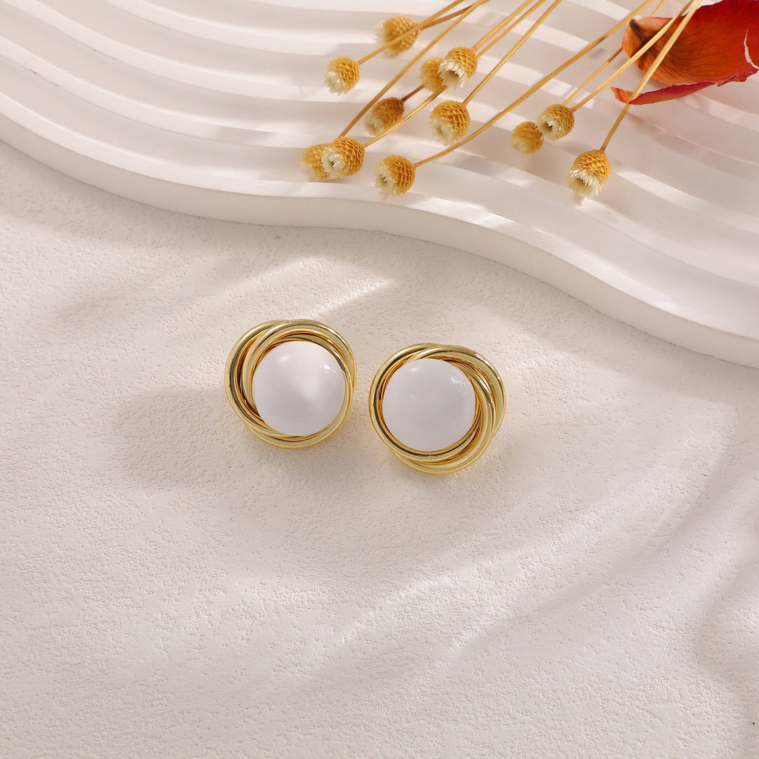 Women’s earrings with elaborate design and luminous accent Nin Boutique