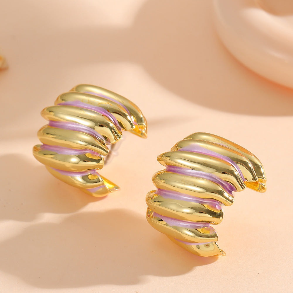 Ladies' jewelry earrings in elegant wave pattern Nin Boutique