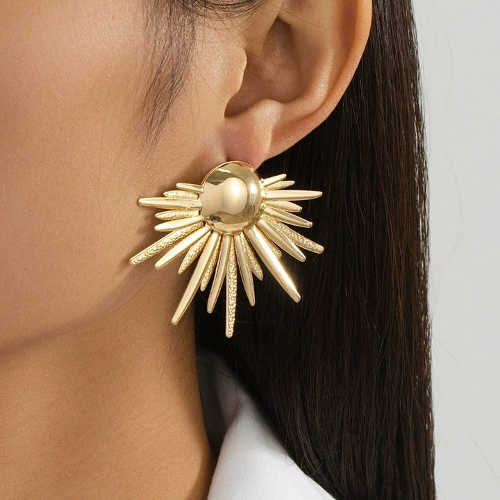 Ladies earrings in artistic sunbeam design Nin Boutique