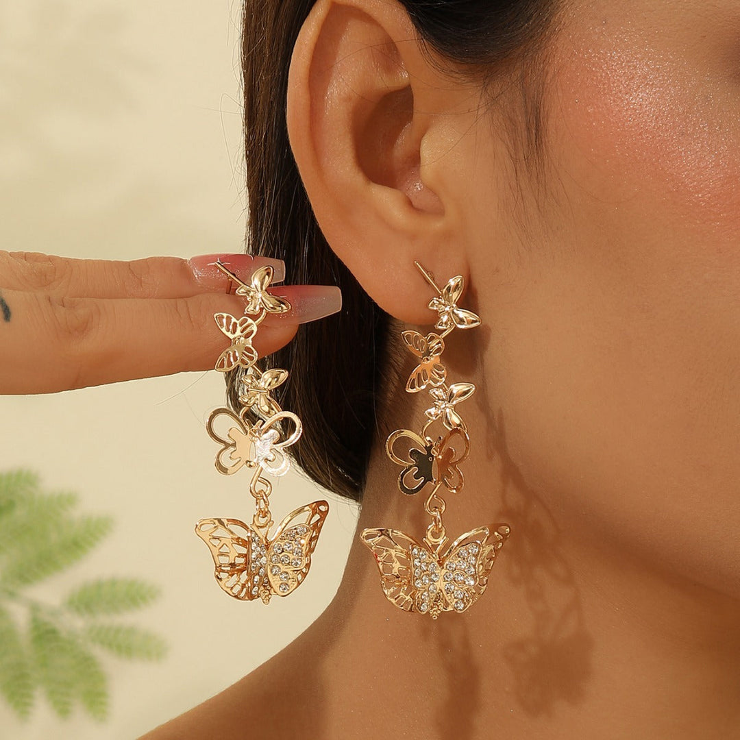 Ladies earrings with elaborate butterfly design Nin Boutique