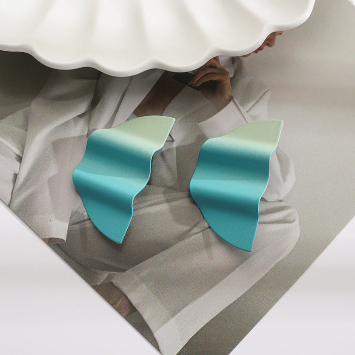 Women’s earrings in modern wave design Nin Boutique