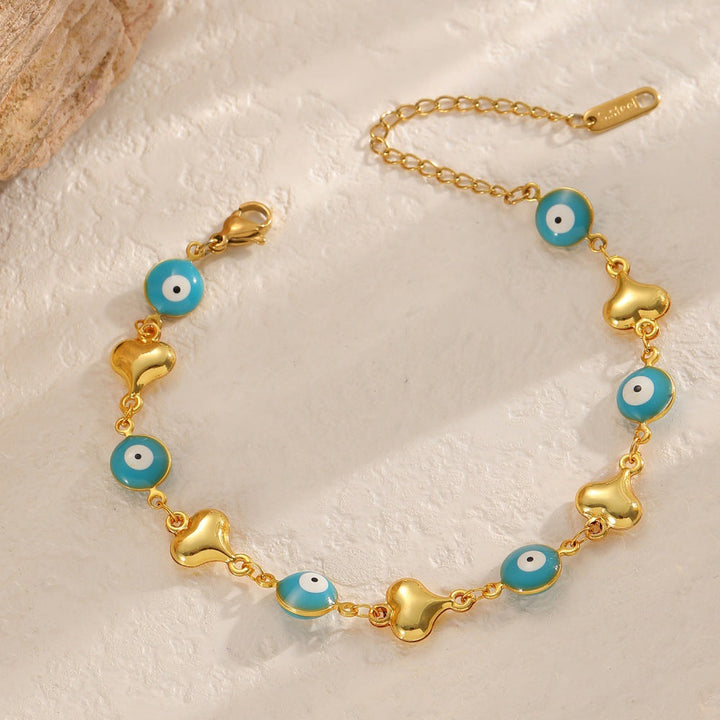 Ladies bracelet with elaborate pendants Nin Boutique
