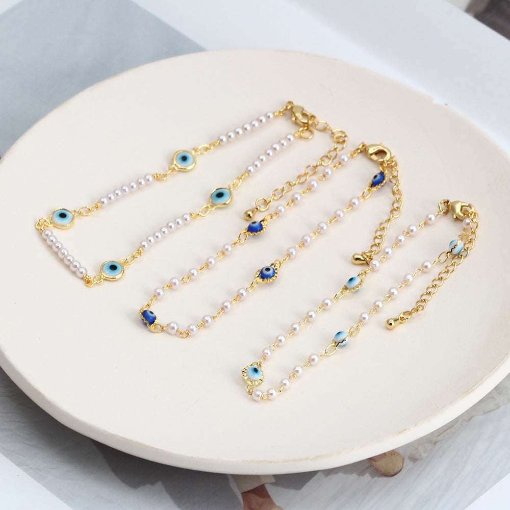 Women's ankle bracelet with protective eye and delicate pearl elements Nin Boutique