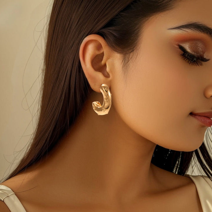 Ladies earrings in artistic flower design Nin Boutique