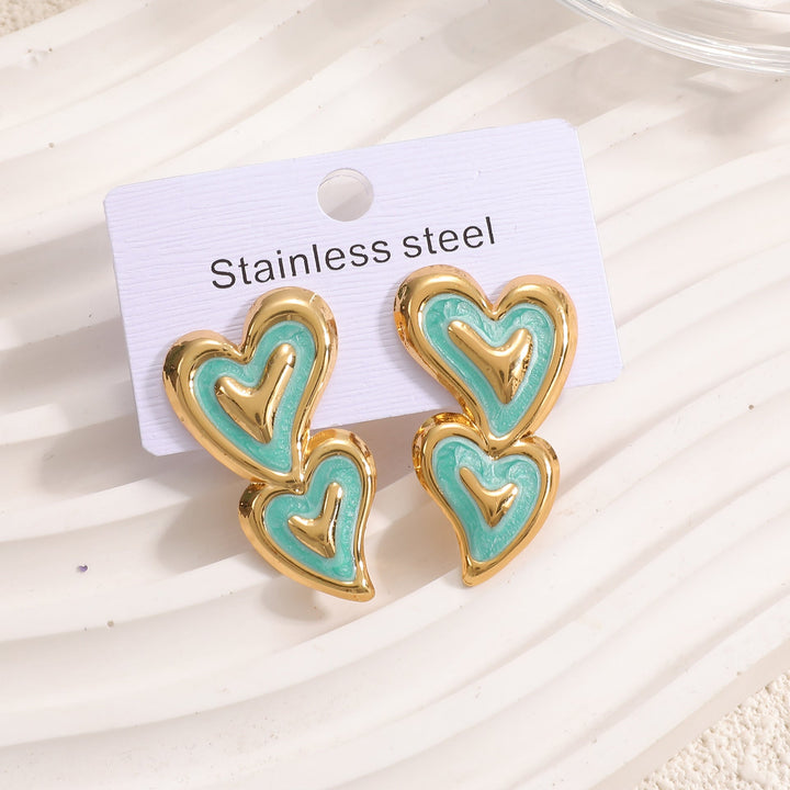 Ladies earrings in playful heart design Nin Boutique