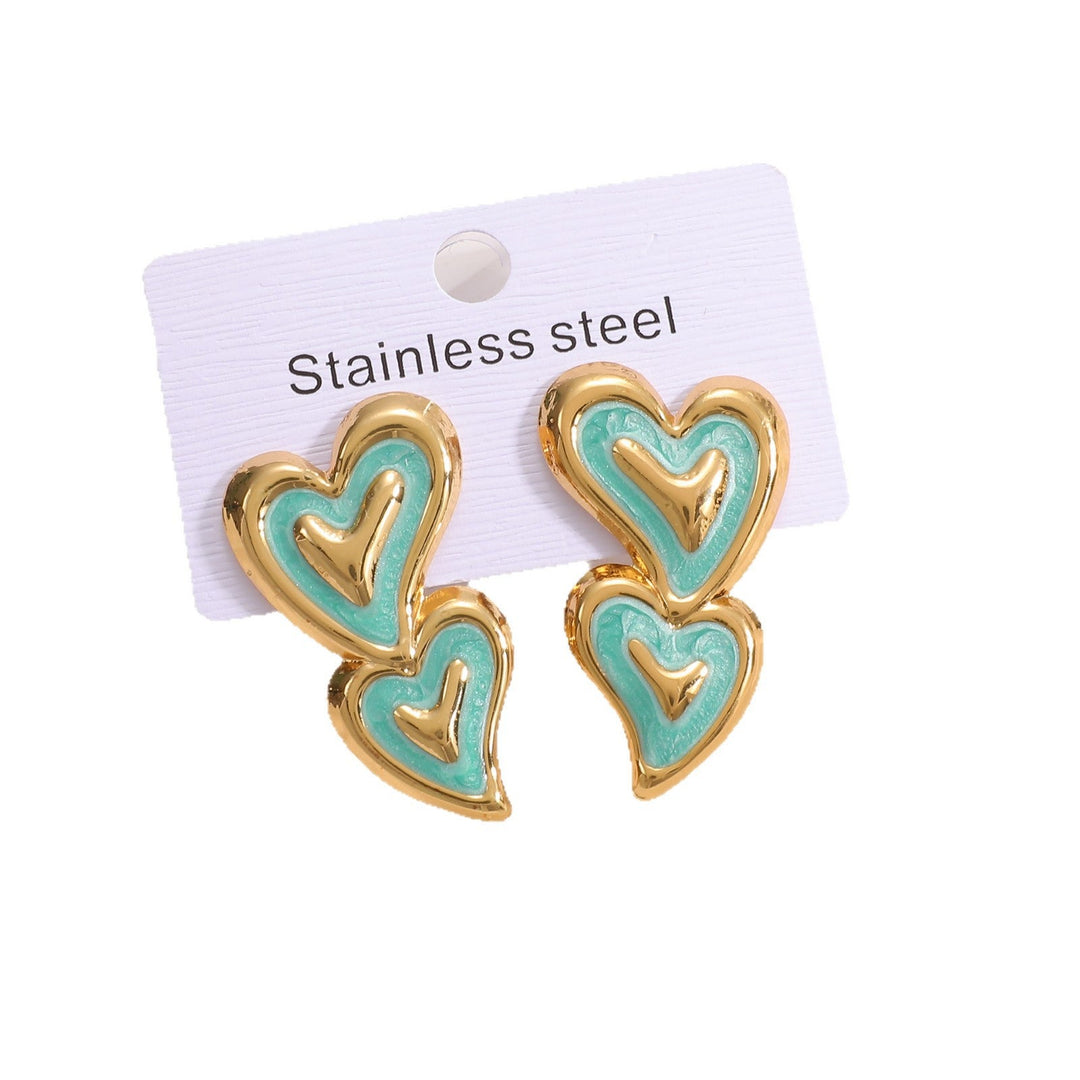 Ladies earrings in playful heart design Nin Boutique