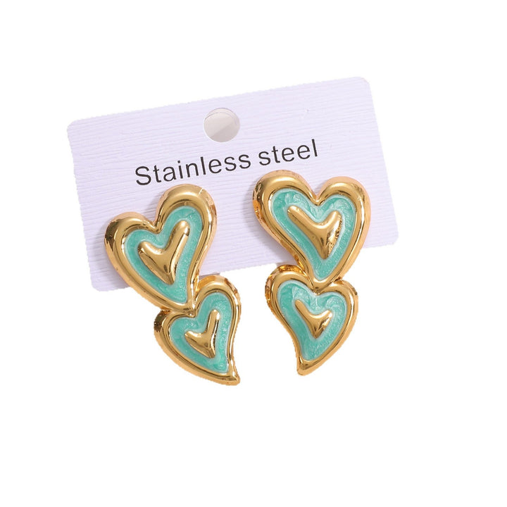 Ladies earrings in playful heart design Nin Boutique