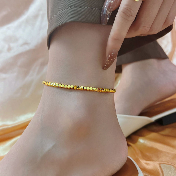 Women's filigree anklet made of shiny metal Nin Boutique
