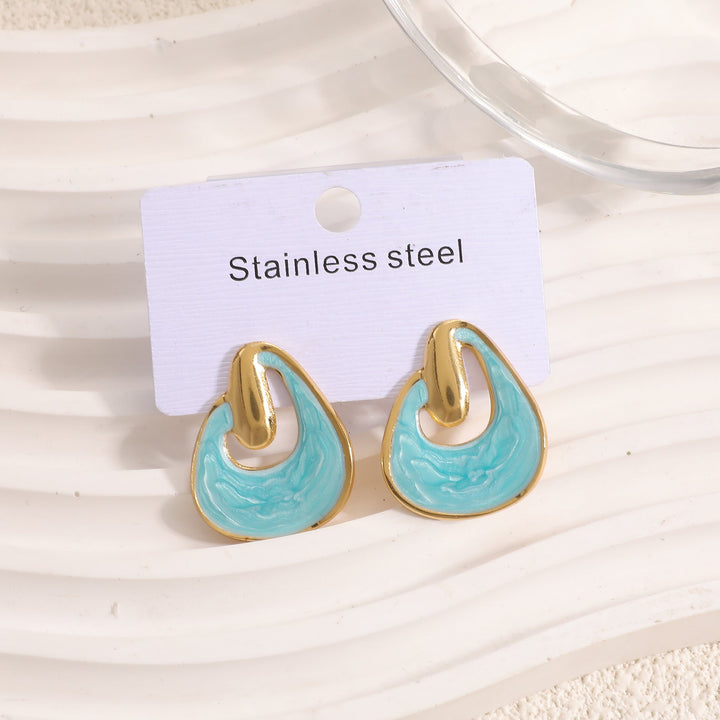 Ladies earrings in a modern, flowing design Nin Boutique