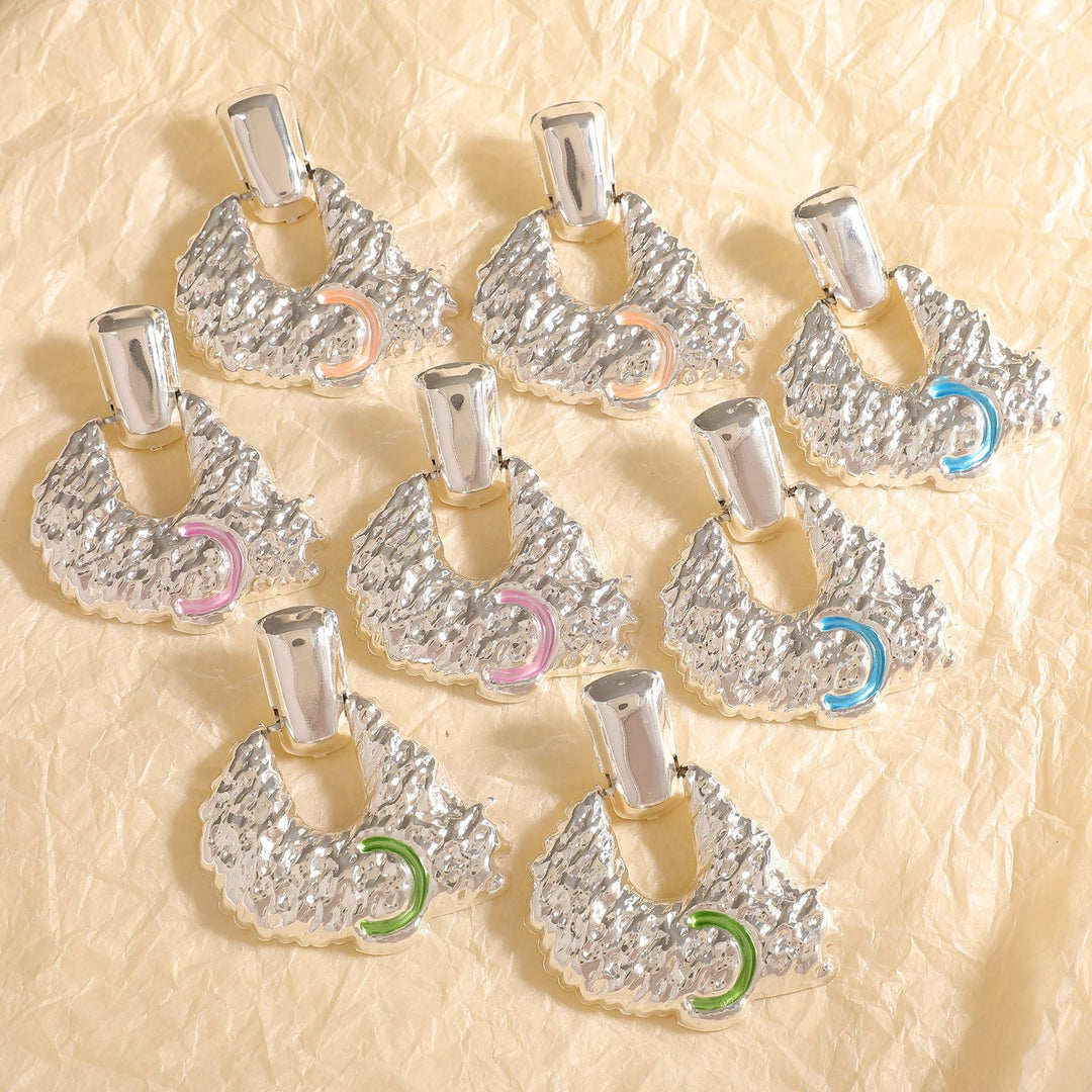 Women's earrings in artistic relief design Nin Boutique