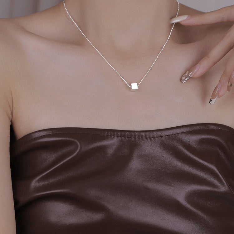 Women's necklace with modern, geometric cube pendant Nin Boutique