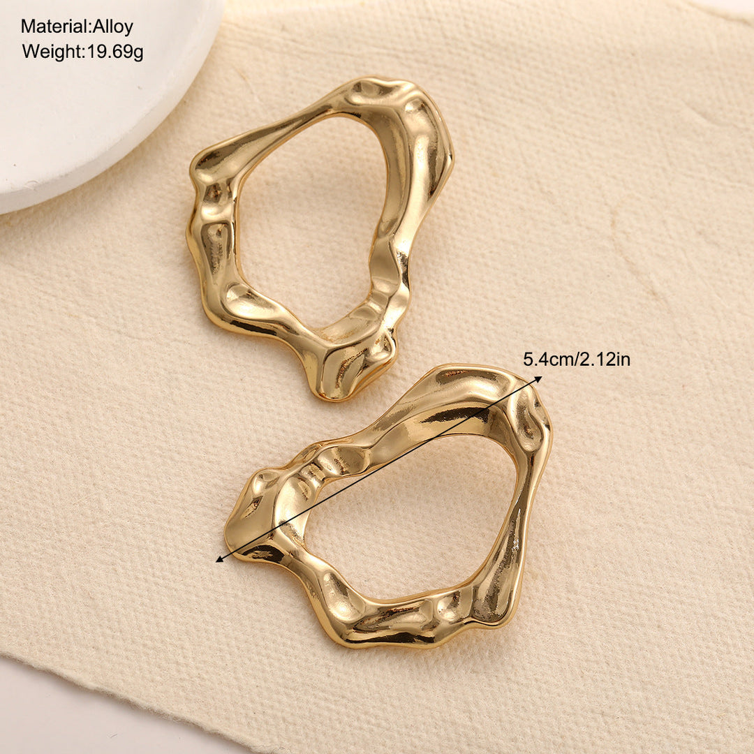 Ladies earrings in modern, flowing design Nin Boutique