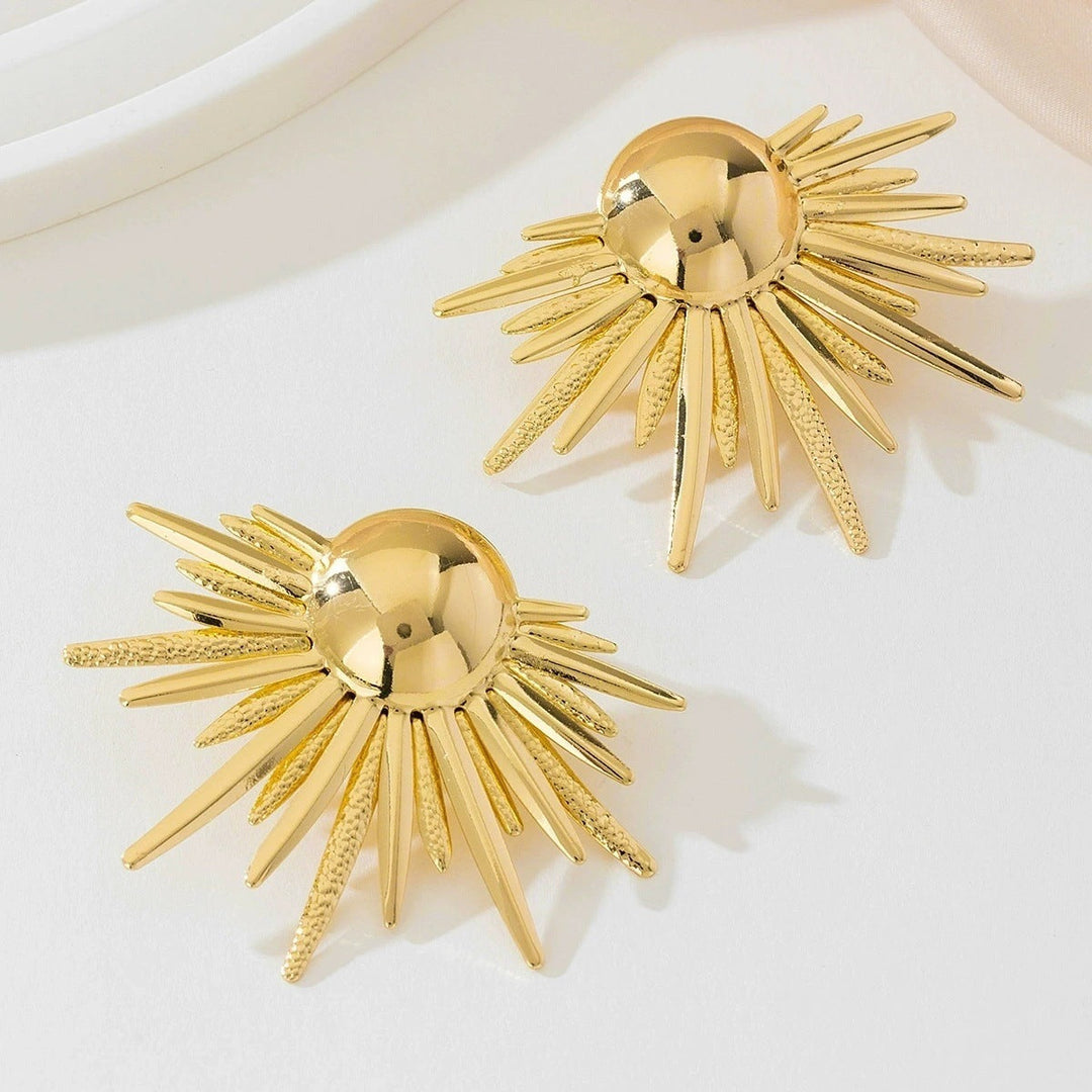 Ladies earrings in artistic sunbeam design Nin Boutique