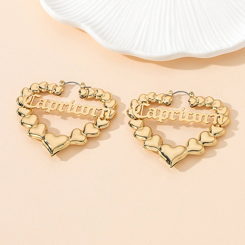 Women’s earrings with unique heart design and astrological element Nin Boutique