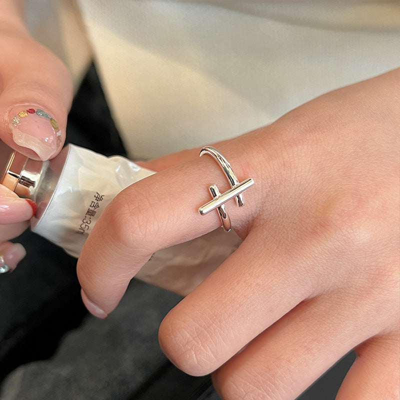 Women's open ring with modern cross design Nin Boutique