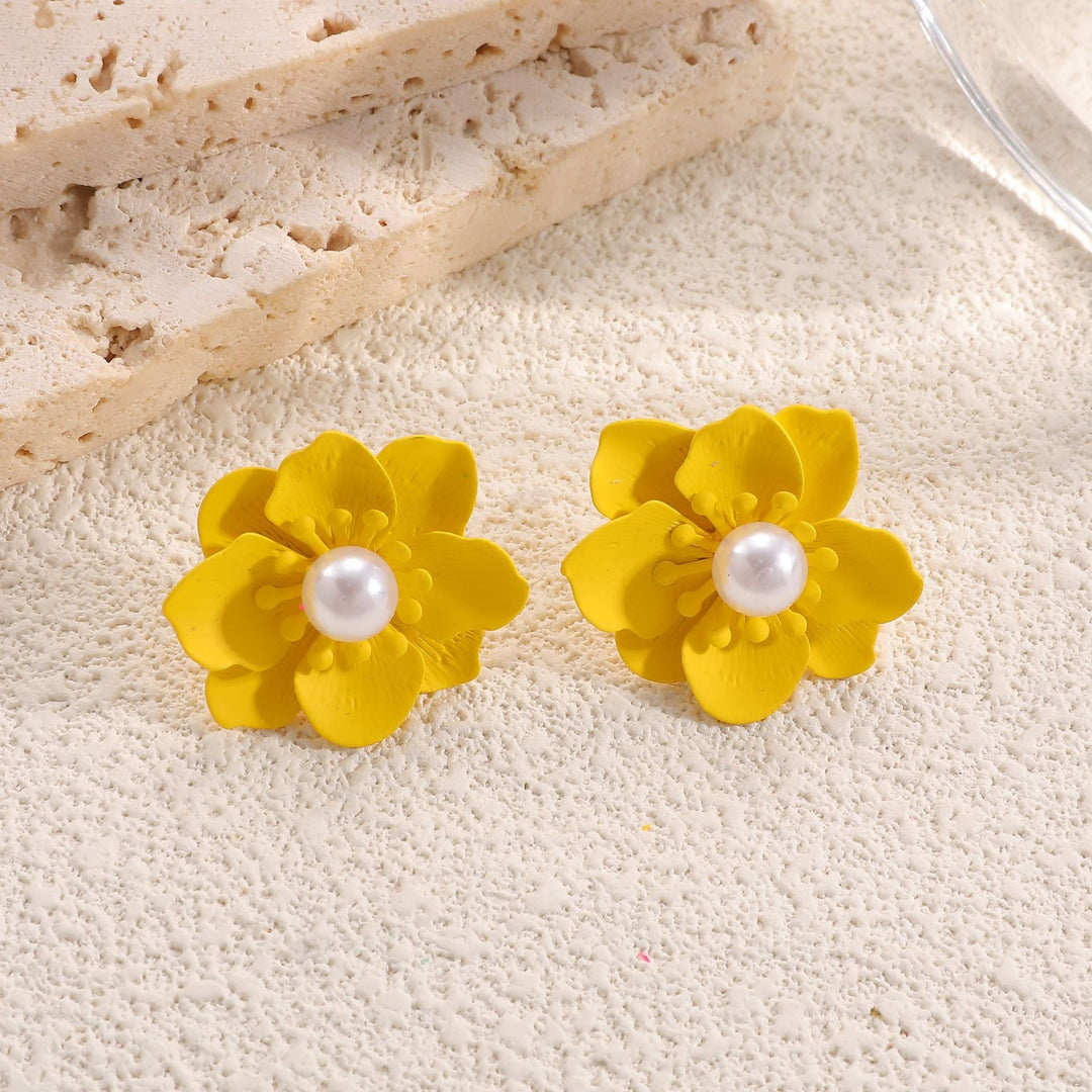 Ladies earrings in artistic floral style with pearl accent Nin Boutique