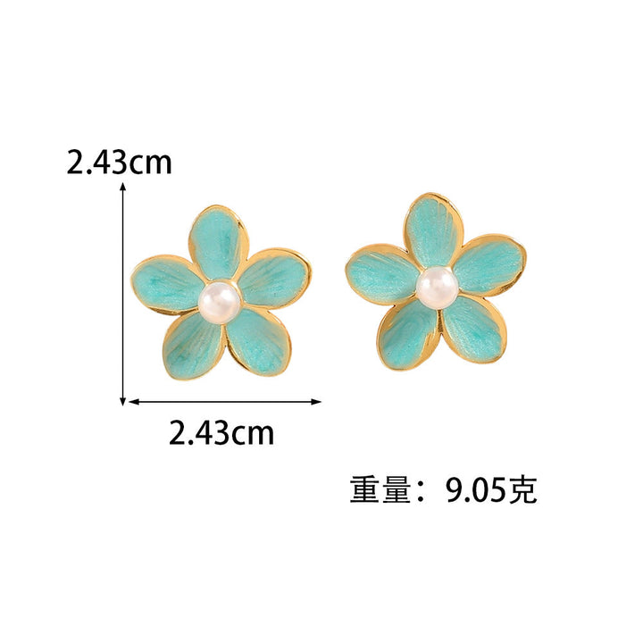Women’s earrings with ornate floral pattern Nin Boutique