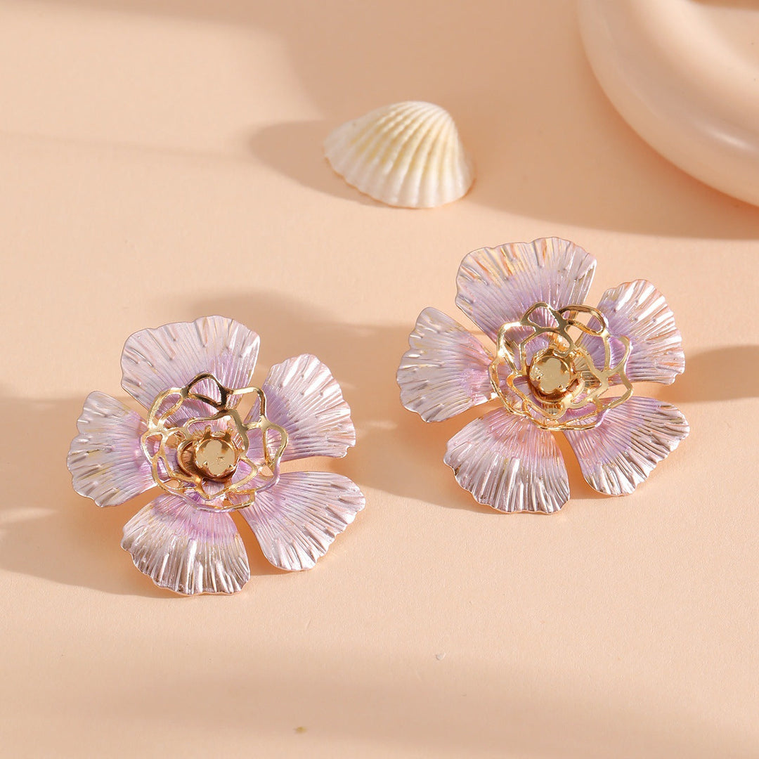 Ladies stud earrings in an artistic flower design Nin Boutique