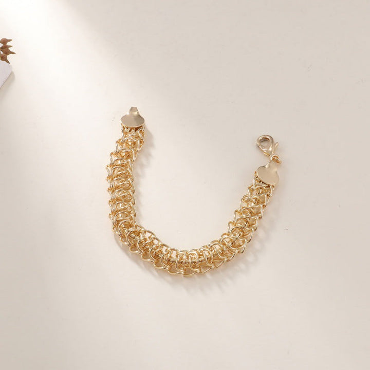Ladies bracelet with intricately woven design and noble semi-precious stones Nin Boutique
