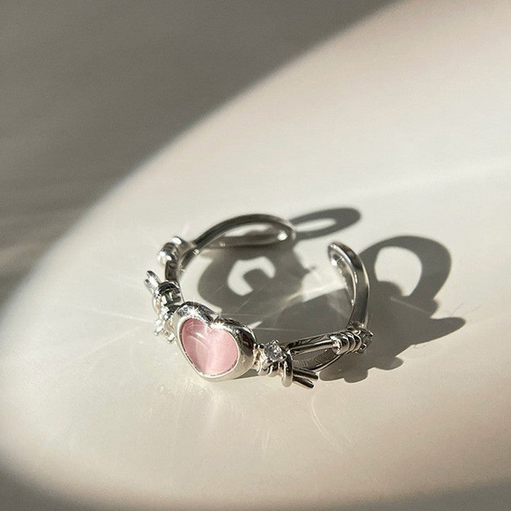 Ladies Open Ring with Heart-Shaped Pendant and Sparkling Accents Nin Boutique