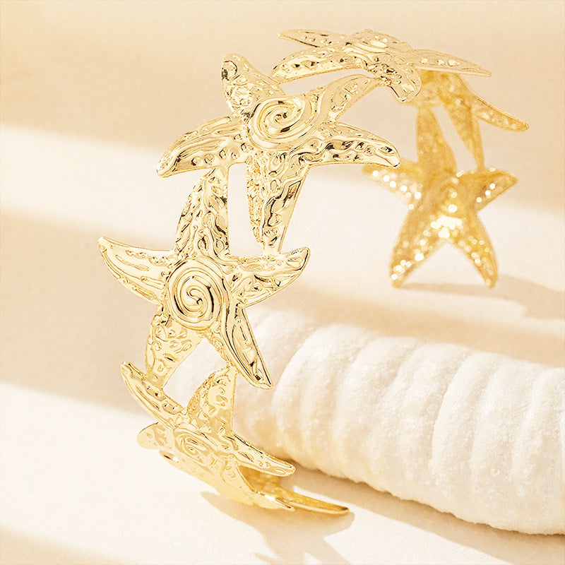 Ladies bracelet with intricate starfish design Nin Boutique