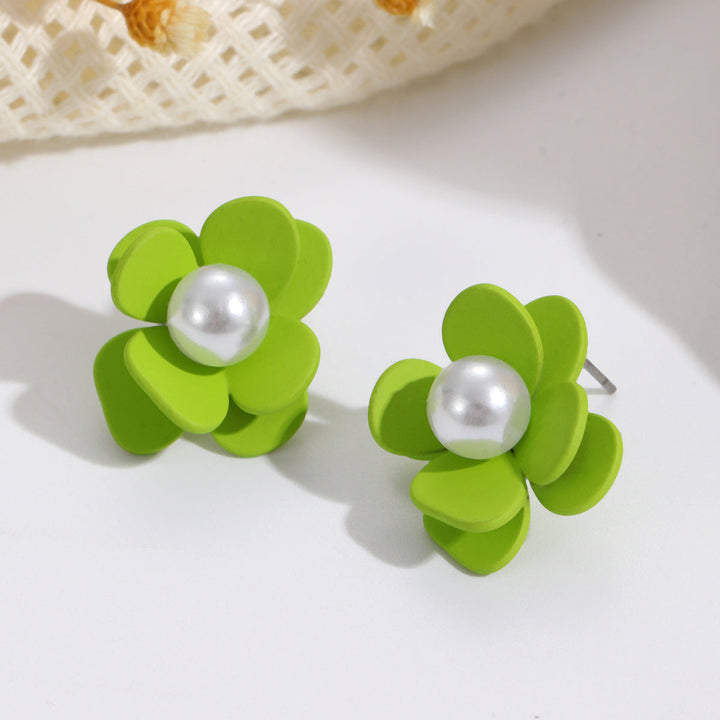 Ladies earrings in vibrant floral design with pearl accent Nin Boutique