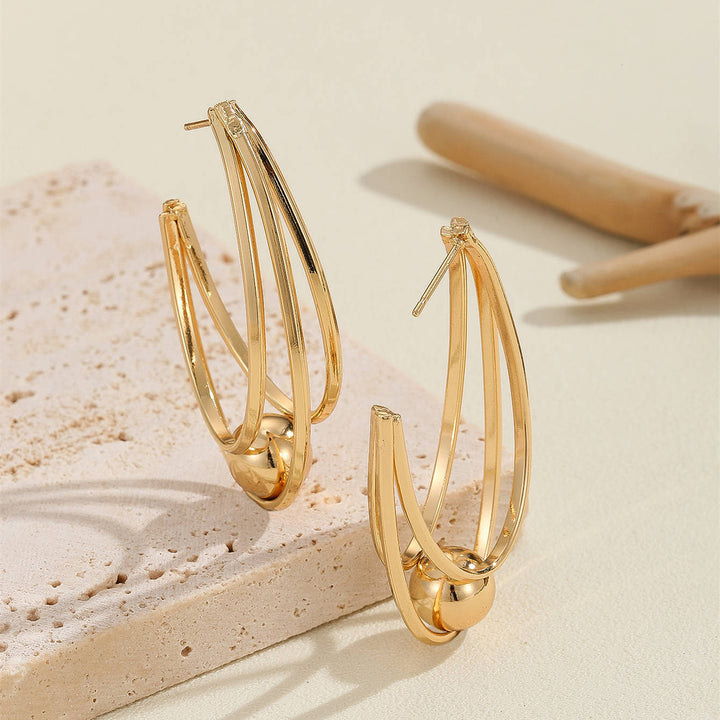 Women's earrings with elegant, curved lines Nin Boutique