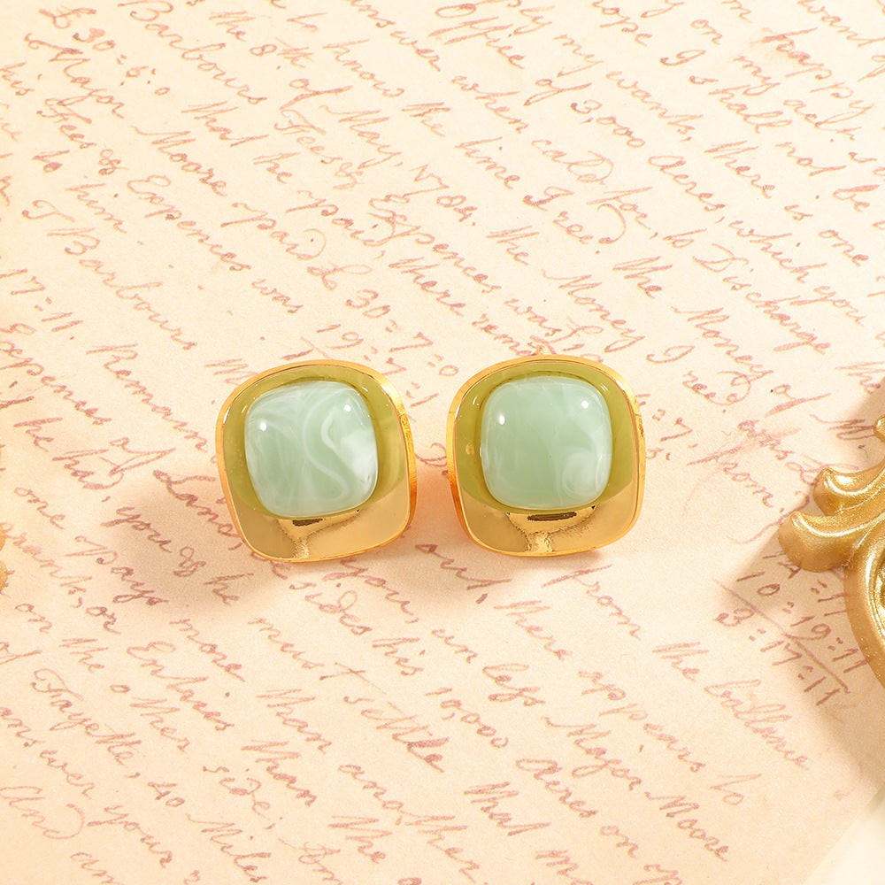Women’s earrings with elegant green semi-precious stone and golden frame Nin Boutique