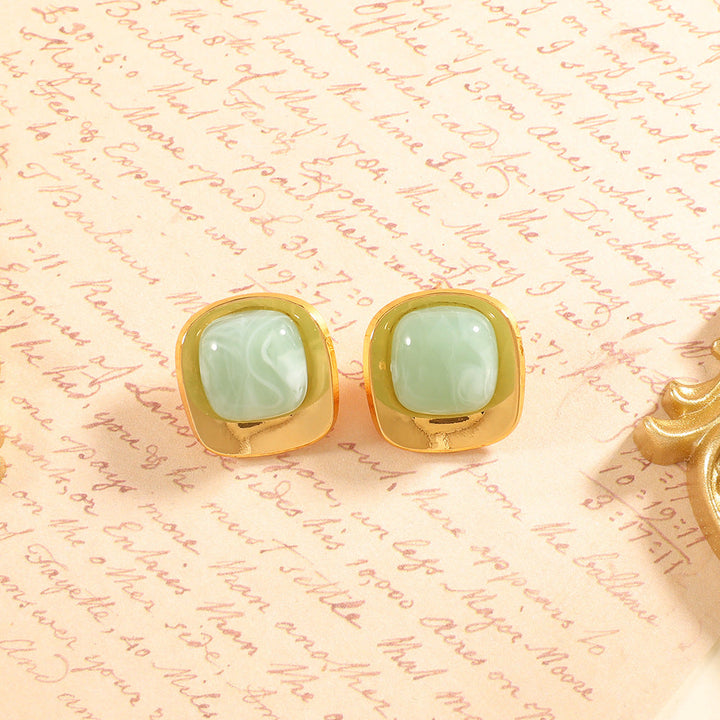 Women’s earrings with elegant green semi-precious stone and golden frame Nin Boutique