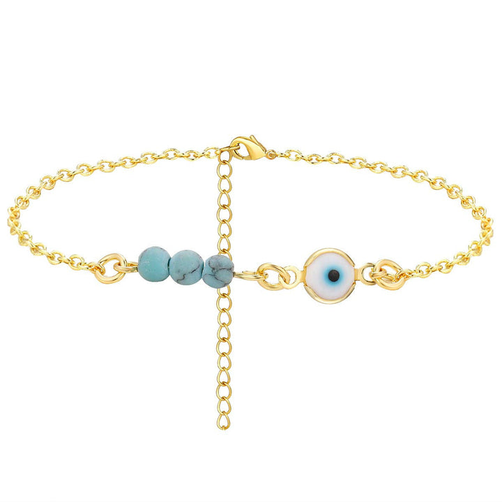 Ladies anklet with protective eye motif and colorful gemstone accents Nin Boutique
